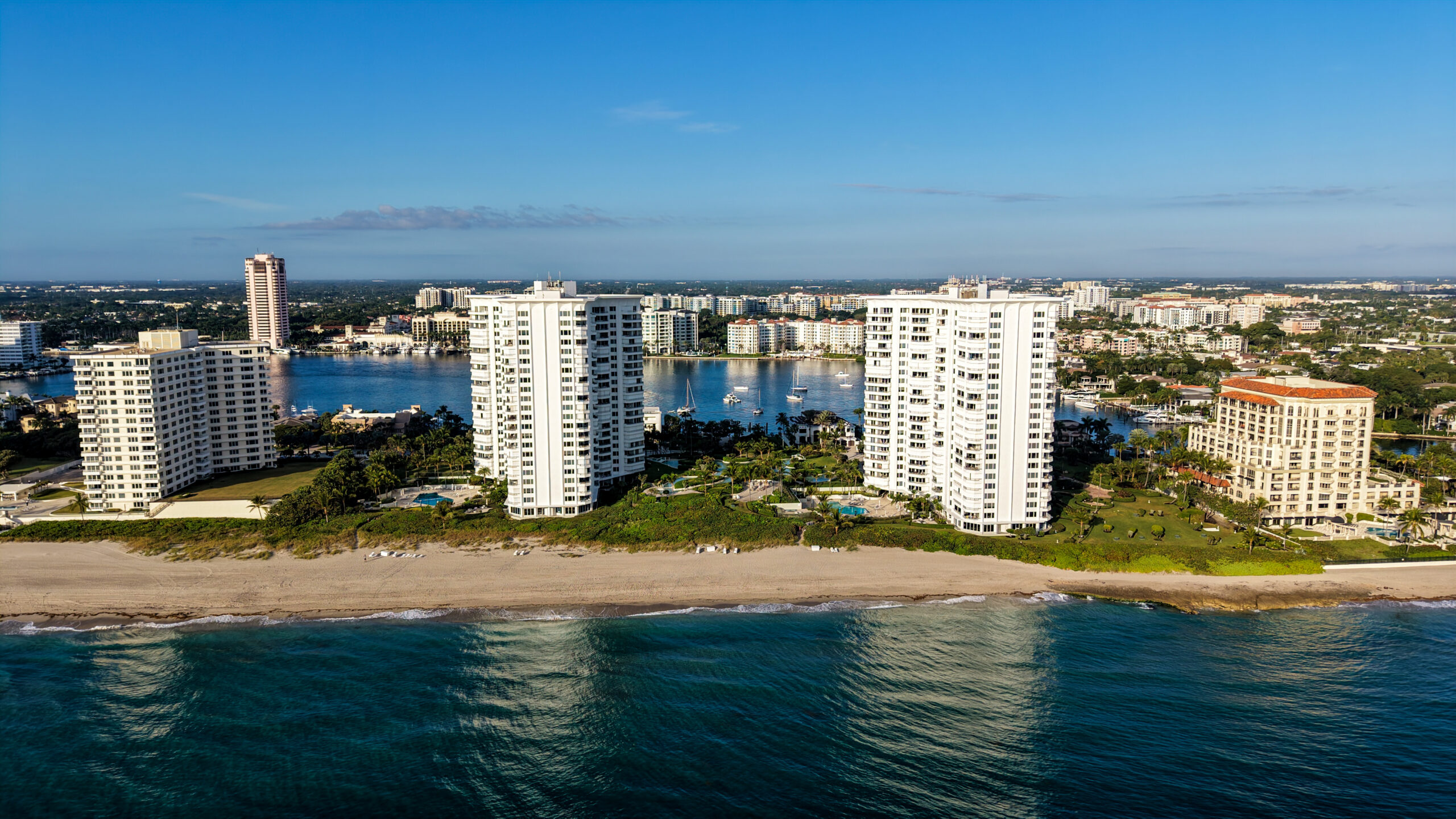 Aerial view of Chalfonte oceanfront towers in Boca Raton with Lake Boca in the background