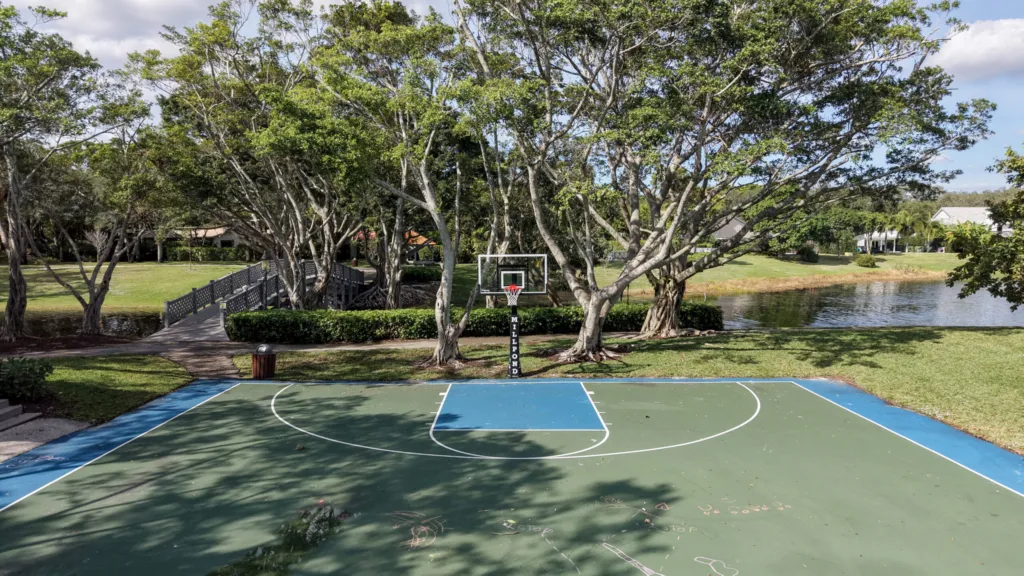 Basketball court next to the lake in the Millpond neighborhood of Boca Raton