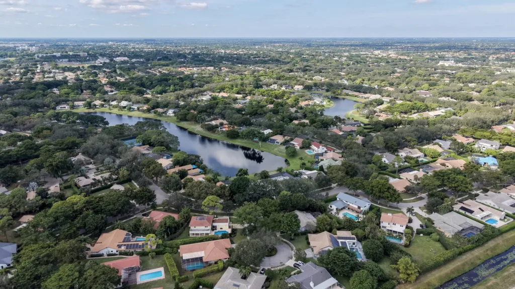 Curved tree-lined street in the Millpond neighborhood of Boca Raton