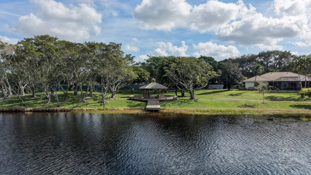 Seating area overlooking the lake in the Millpond neighborhood of Boca Raton