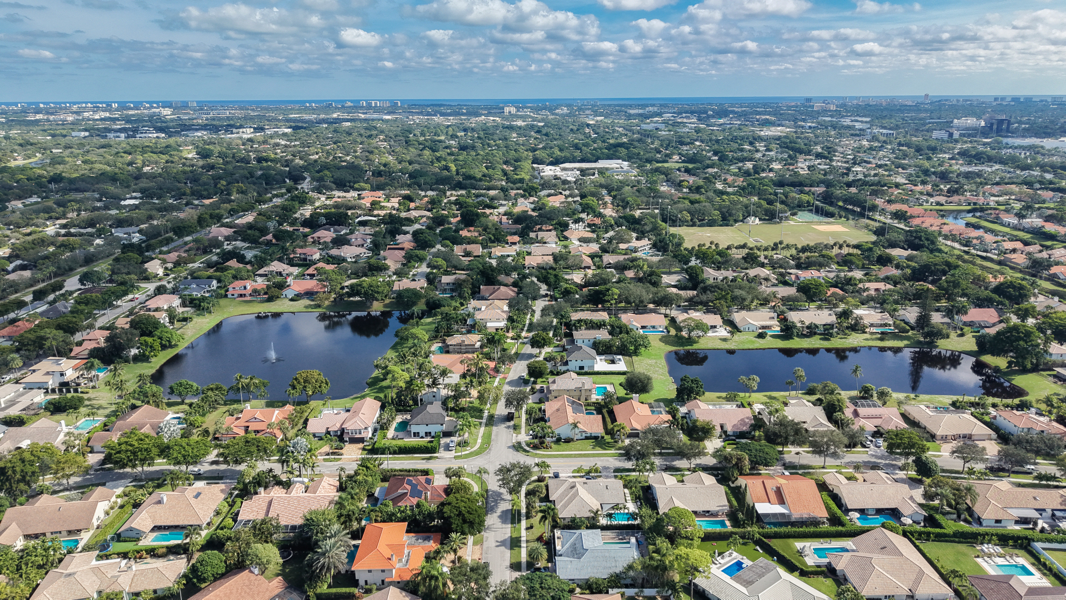 Aerial view of New Floresta in Boca Raton showing interior lakes and estate-style homes
