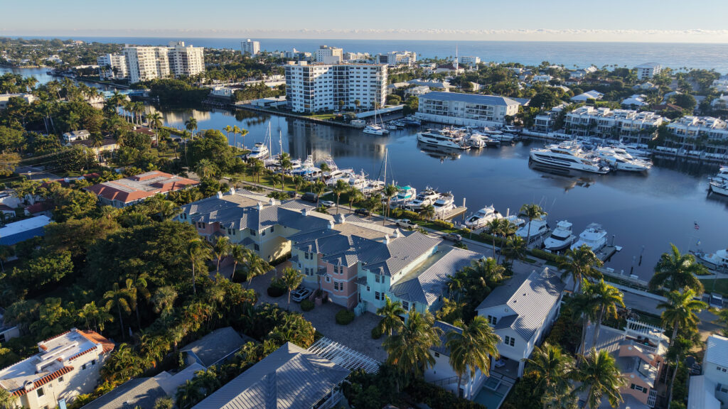 Intracoastal marina basin with yachts near Palm Trail in Delray Beach, Florida, with the Atlantic Ocean in the background