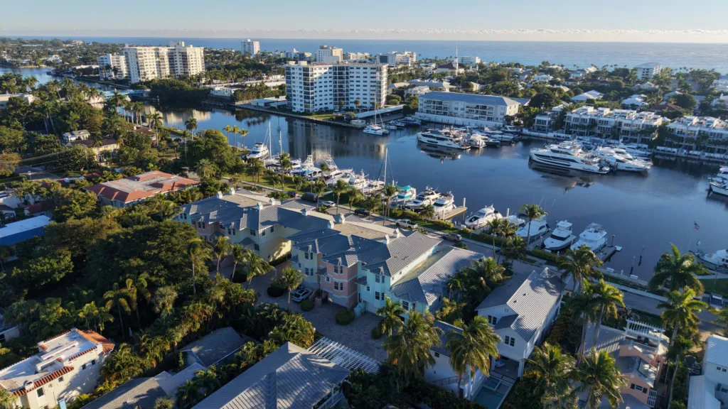 Intracoastal marina basin with yachts near Palm Trail in Delray Beach, Florida, with the Atlantic Ocean in the background