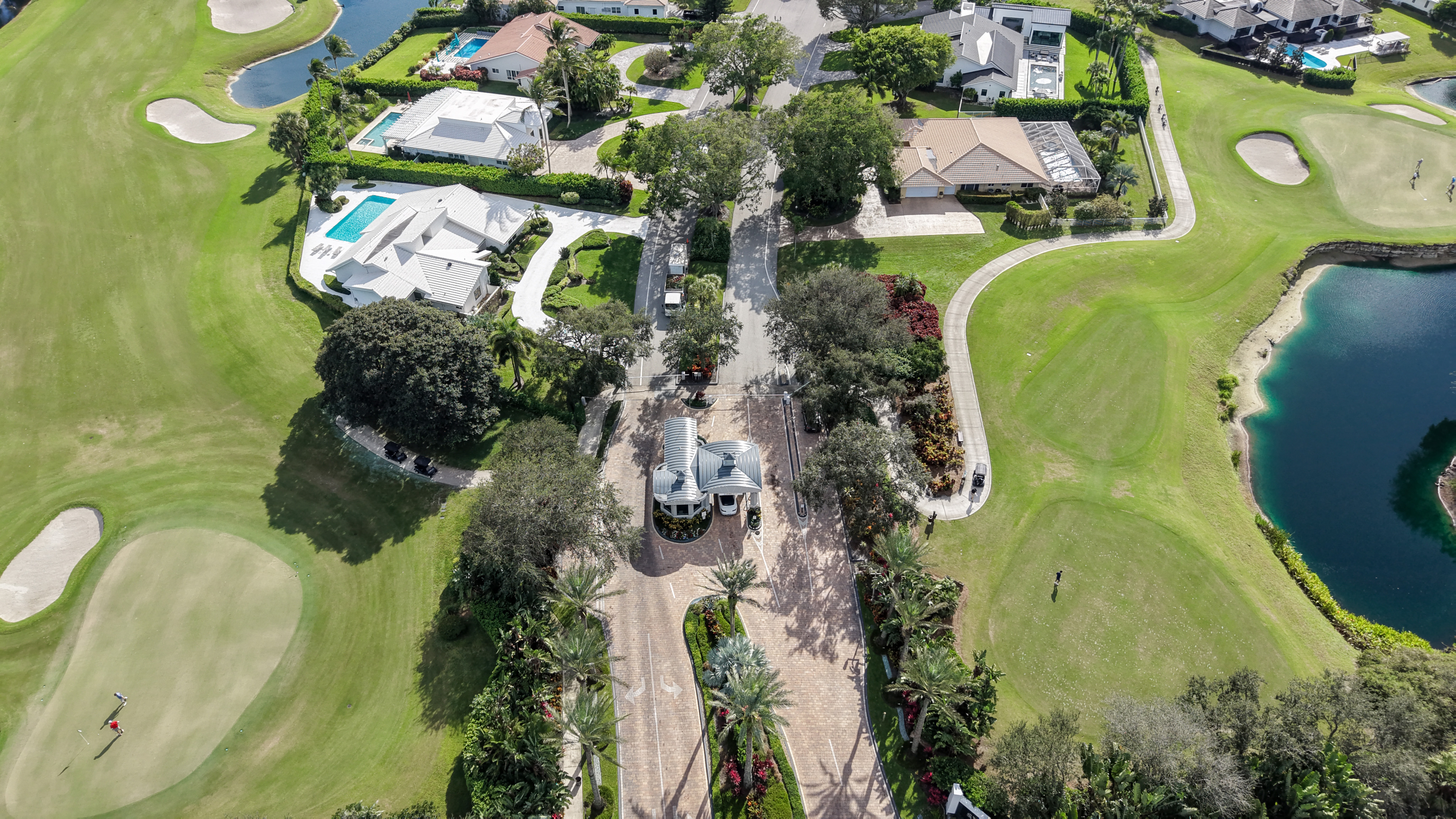 24-hour guarded entry gate at The Hamlet in Seagate Country Club