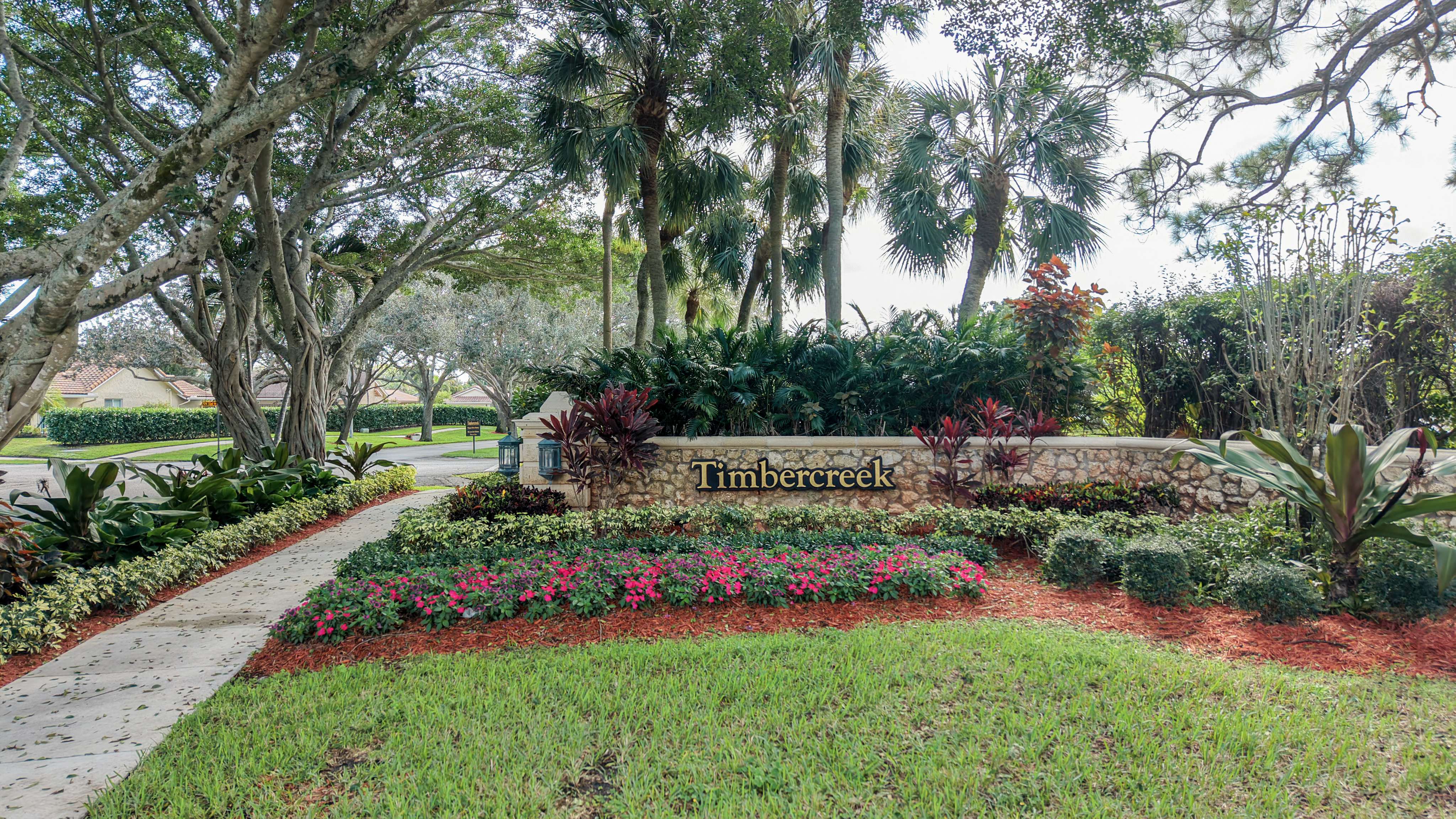 Timbercreek Boca Raton neighborhood entrance sign and landscaping
