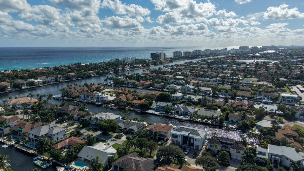 Aerial view of waterfront single-family homes in Tropic Isle Delray Beach