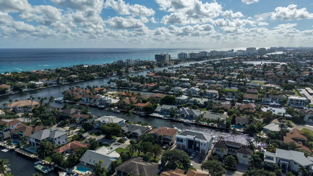 Aerial view of waterfront single-family homes in Tropic Isle Delray Beach