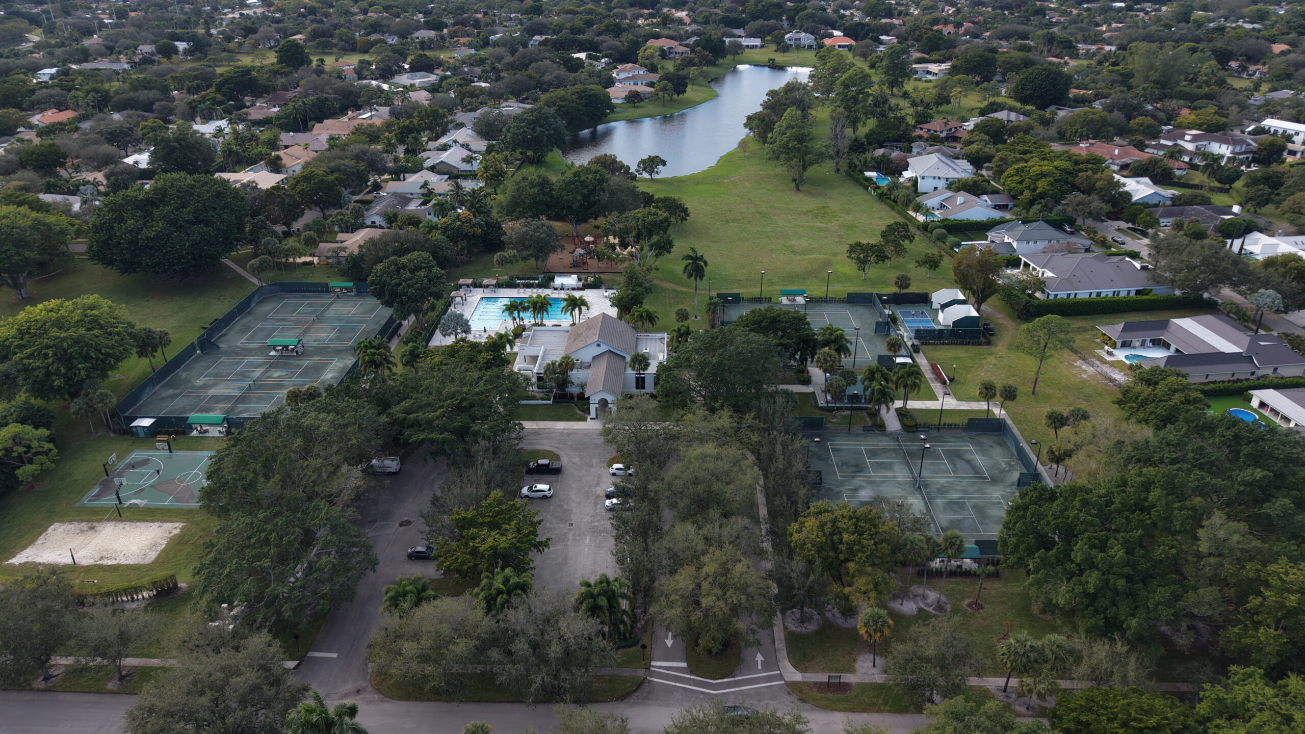 Tennis courts, pool, and clubhouse amenities at Boca Bath & Tennis in Boca Raton