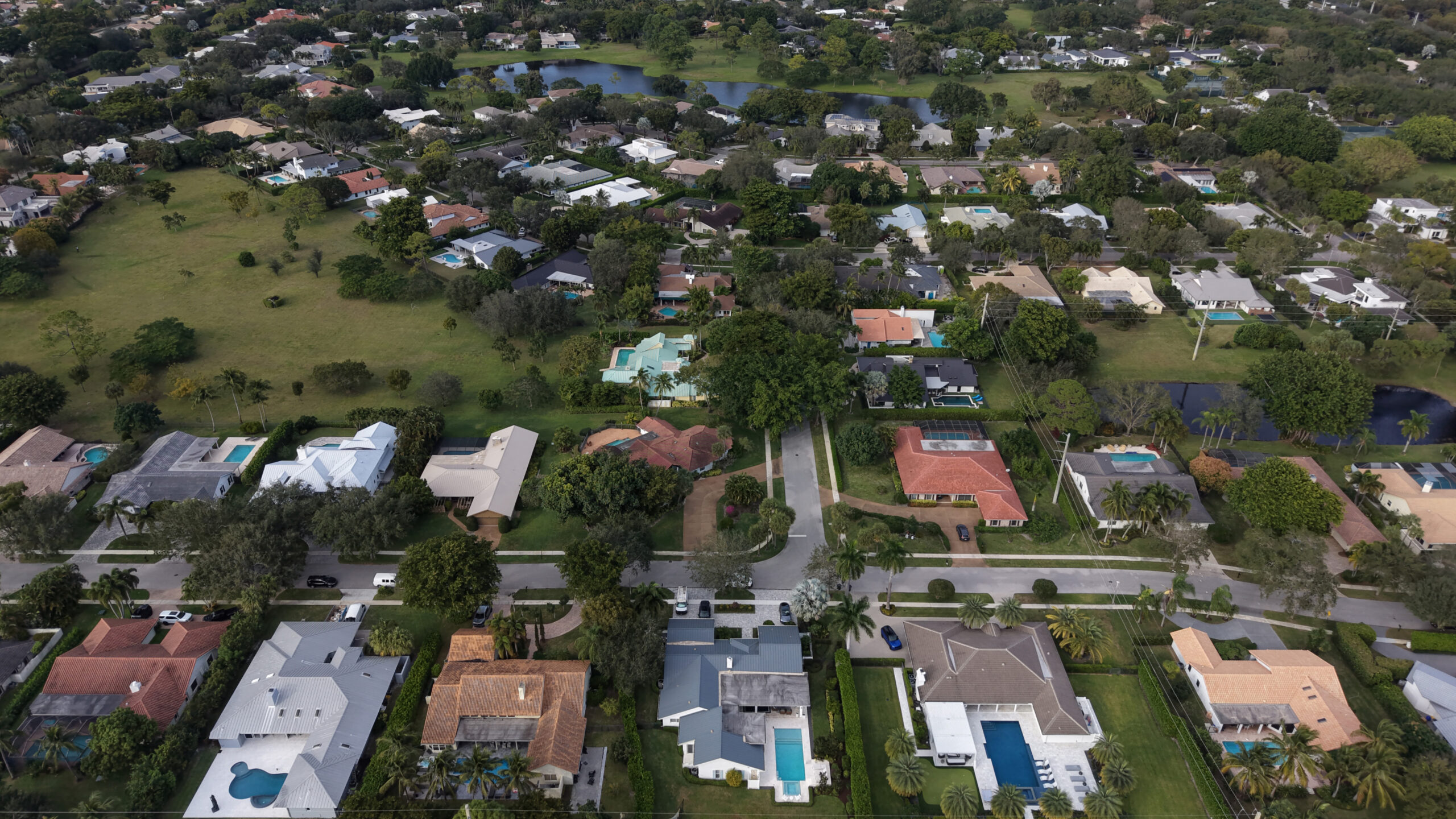 Large lots and open green space inside Boca Bath & Tennis neighborhood