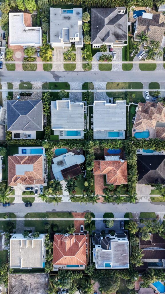 Top-down aerial of homes and pools in the Golden Triangle area of Boca Raton